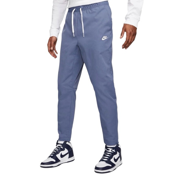 Nike Other - Nike Men’s Woven Tapered Leg Pants size Small in Blue